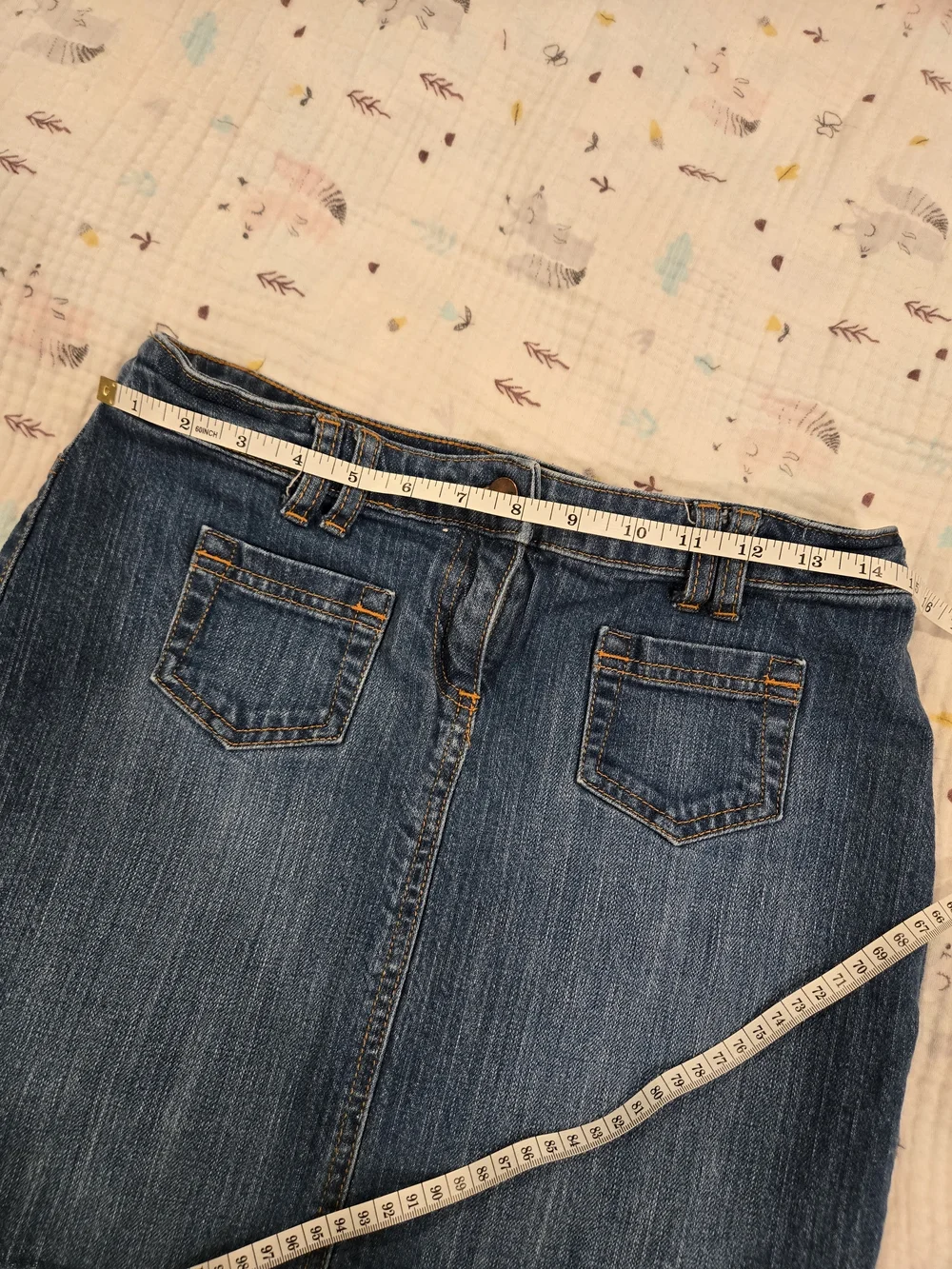 *New York & Company* Blue Denim Mini Skirt with Front Pockets